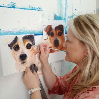 Sunday L Artist painting a pet portrait of a jack russell terrier